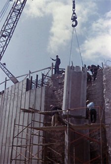 Figure 6: Lifting a precast concrete quoin unit into place