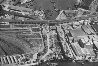Figure 9: Aerial view of site at high tide in the river Thames during the peak construction period